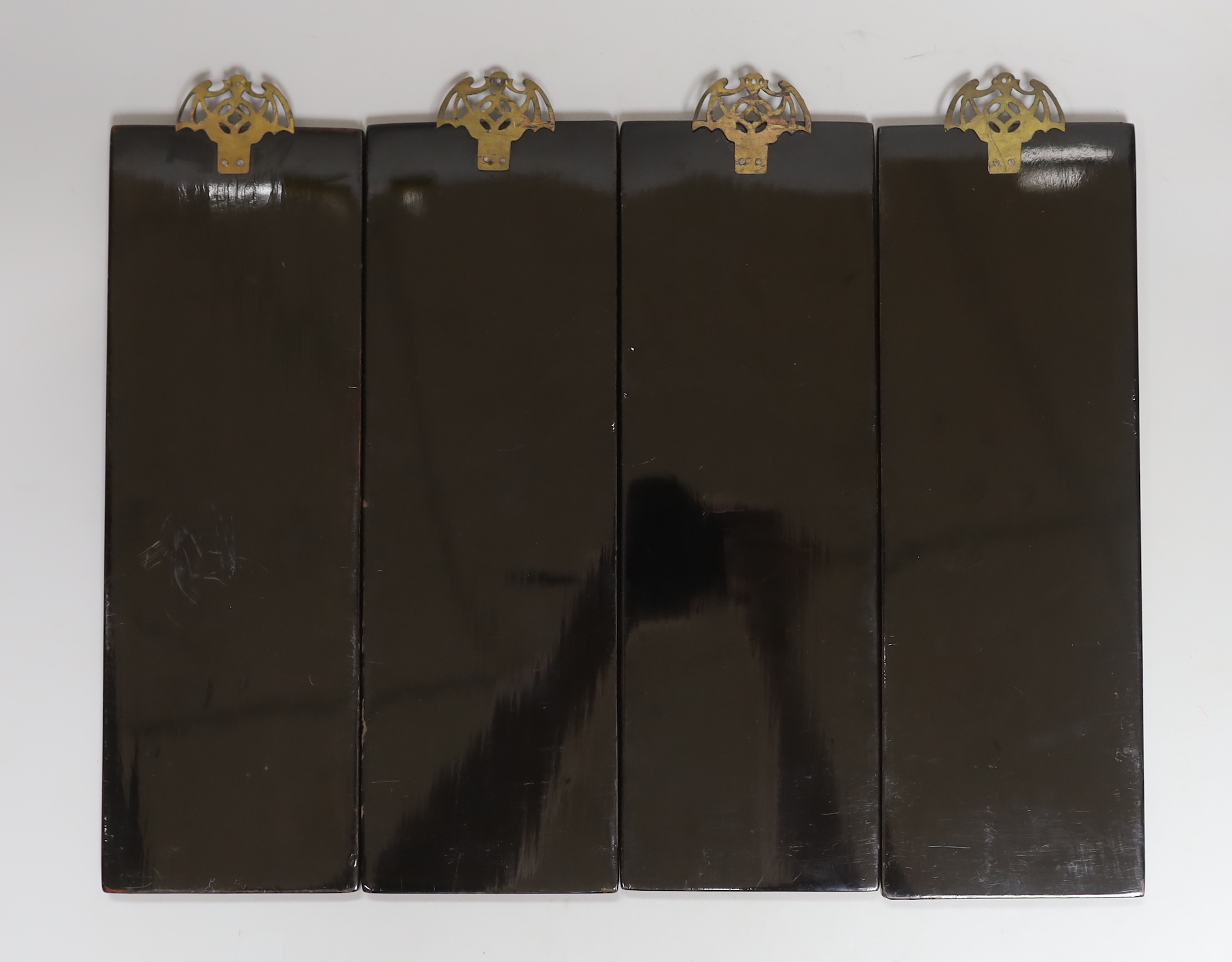A set of four Chinese lacquer and mother-of-pearl panels, 30x10cm